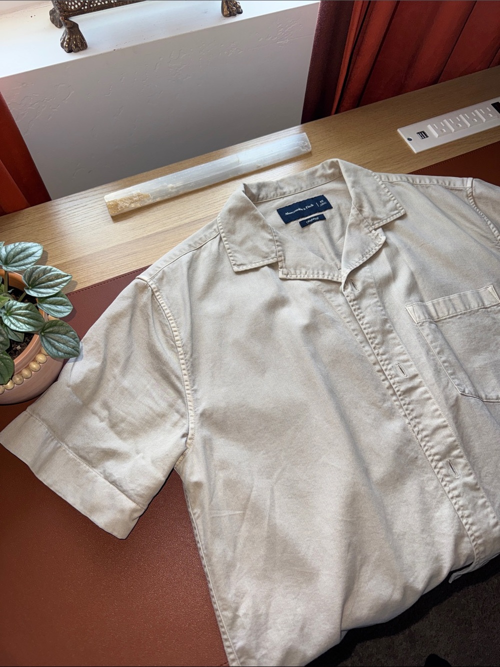 Abercrombie Short Sleeve cropped Button Shirt in Beige with relaxed collar.